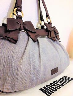 Chic Canvas Bag With Rolled Handles, Chic Canvas Bags With Rolled Handles, Designer Cotton Shopping Bags, Chic Brown Cotton Bags, Designer Cotton Tote Shoulder Bag, Designer Shoulder Bag With Rolled Handles, Designer Cotton Bag, Luxury Cotton Bags With Dust Bag Included, Designer Cotton Bags For Daily Use