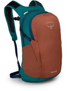 a brown and teal backpack with an owl on the back pack attached to it