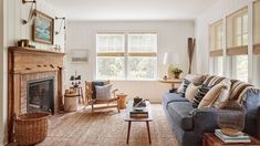 a living room filled with furniture and a fire place