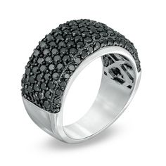 a ring with black diamonds on it