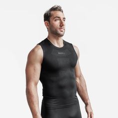 MEN'S MIDWEIGHT SEAMLESS COMPRESSION SLEEVELESS TOP | BLACK | NOBULL Sleeveless High Stretch Seamless Activewear, Compression Sleeveless Activewear With Seamless Design, Seamless Compression Sleeveless Activewear, Sleeveless Compression Activewear With Seamless Design, Breathable High Stretch Functional Tank Top, Compressive Seamless Sleeveless Activewear, Compression Seamless Tank Top For Sports, Compressive Sleeveless Seamless Activewear, High Stretch Functional Sweat Resistant Tank Top