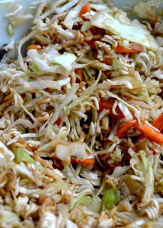 shredded carrots and cabbage in a white bowl