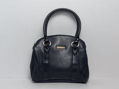 "1990s Liz Claiborne black leather top handle handbag. Zipper closure. Two inside compartments with a center zip full compartment and a zip small pocket. Gold toned hardware. In good vintage condition  Approx size: 8.75\" x 8\"  x 2\"" Vintage Liz Claiborne, Black Leather Top, Top Handle Bags, Top Handle Handbags, Liz Claiborne, Leather Top, Purses And Handbags, Top Handle, Top Handle Bag