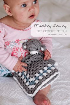 a baby is holding a crocheted stuffed animal in her hands with the caption monkey lovey free crochet pattern