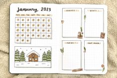 an open planner with christmas decorations on it