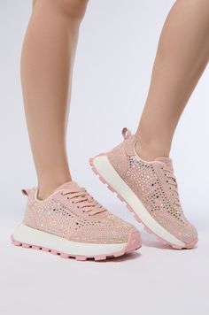 Give your athleisure looks a fabulous upgrade with The AZALEA WANG Nikole Pink Embellished Sneaker. This glam flatform style features an AB rhinestone-embellished faux suede upper, a paneled construction, a round toe silhouette, a low-cut collar, a cushioned insole, and contrast paneling along the midsole. Complete with a cleated rubber outsole, a traditional lace-up vamp, and a tonal back pull tab. Style with a coordinating set for your next weekend errand run.   (all measurements are approximate from size 8) - Faux Suede Upper - Round Toe - Flatform Sole - 1.5” Heel Height - 1” Sole Height - Imported  Product ID: 400656 Athleisure Looks, Azalea Wang, Pull Tab, Low Cut, Faux Suede, Athleisure, Athletic Shoes, Heel Height, Lace Up