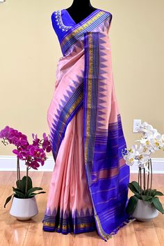 Fabric : Pure Kanjivaram Silk Type : Thread work korvai contrast Body Color : Light lotus pink Border Color : Bluish purple Blouse Color: Bluish purple Pallu Color: Bluish purple Approximate height - 46 - 52" Approximate weight - 1.4 lbs Approximate Length - 6.25 - 6.50 mtrs (inclusive of blouse length) Technique on the blouse : Aari and mirror work Saree comes with fall, picot and tassels done when applicable. Blouse piece is cut. Kindly Note : The colors you see on your device may vary due to Fusion Style Pink Dupatta For Diwali, Pink Fusion Dupatta For Diwali, Pink Fusion Style Dupatta For Diwali, Pink Traditional Wear With Border For Puja, Purple Art Silk Traditional Wear With Border, Purple Saree With Border In Traditional Drape, Festive Pink Saree With Border Details, Pink Art Silk Traditional Wear With Border, Festive Pink Saree With Border