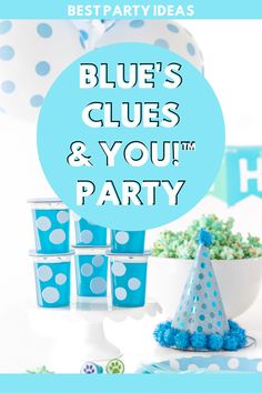 blue and white party decorations with the words blue's clues and you & your party