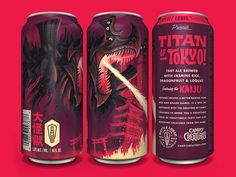 three cans of soda with godzilla illustrations on the front and back, one is red