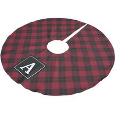 a red and black plaid cloth with the letter a on it