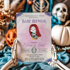 a baby shower with skeleton hands holding up a card for it's birth day