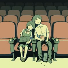 two people sitting in front of an empty theater seat, one holding a popcorn box