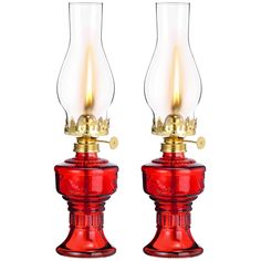 pair of red glass lamps with gold trimmings on each side and one light turned on