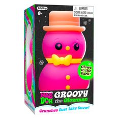 a pink toy with a bow tie and hat on it's head in a box