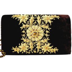 Glitter and sparkle with this luxury brown velvet evening clutch bag with a hand embroidered metallic gold center accented with a genuine tiger eye stone, garnets and carnelian stones.   It is just the right size to hold your essentials for the night - phone, credit cards, money, keys and lipstick. The shoulder strap keeps your hands free for carrying a drink or holding a plate of food. Or twist the shoulder strap into a double hand strap for another elegant look. This is the perfect party piece Holding A Plate, Peacock Clutch, Velvet Clutch Bag, Bling Bags, Velvet Clutch, Gold Luxury, Party Clutch, Brown Velvet, Floral Tapestry