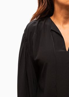 Feel confident and stylish in the Maria Cher Cabrera Cocs Blouse. This style features cinched tie sleeves and a V-neck that add a classic yet unique touch. Crafted from luxurious silk crepe, this top will become your go-to for an effortlessly chic look. 100% Silk Dry Clean Model is 5’8” and wearing a size XS. Runs true to size, we recommend taking your usual size. Model’s Measurements: 26” waist 34” hips 34" bust Chic Look, Tie Sleeve, Black Xs, Silk Crepe, Blouse Black, Feel Confident, Black Blouse, Dry Clean, V Neck