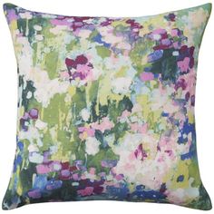 an abstract floral print pillow on a white background