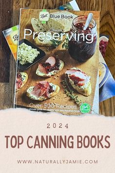 the cover of top canning books on a wooden table