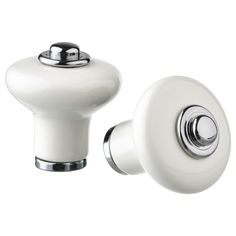 two white knobs with chrome handles on a white background