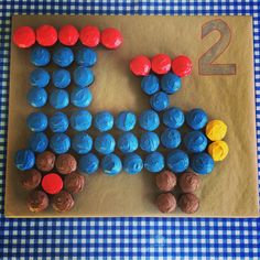 a cake made to look like a dog with red, white and blue frosting