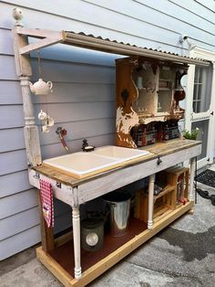 an outdoor kitchen made out of pallets