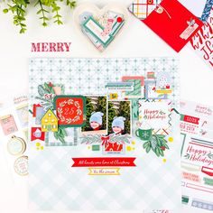 a christmas scrapbook spread with cards, envelopes and other items