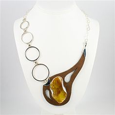 "Baltic Heart" Amber Necklace Luxury Amber Necklace With Polished Finish, Modern Polished Finish Necklace, Modern Amber Pendant Jewelry, Polished Teardrop Amber Necklace, Amber Teardrop Necklace With Polished Finish, Luxury Handmade Teardrop Necklaces, Luxury Handmade Teardrop Necklace, Unique Round Pendant With Polished Finish, Sterling Silver Teardrop Jewelry With Unique Variations