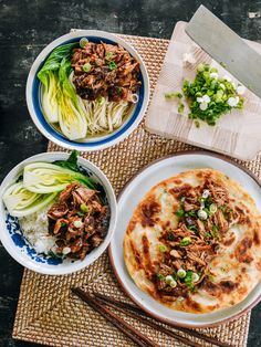 three plates of food on a table with chopsticks