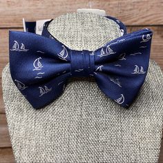 This Pre-Tied Adjustable Nautical Sailboat Bow Tie From Saddlebred Will Be The Perfect Finishing Touch To Any Outfit, Especially For A Boat Lover Or Nautical Ensemble! “Add Nautical Style To Your Outfit With This Sailboat Patterned Bow Tie!” Details: -Pre-Tied/Adjustable Straps -Woven/Polyester I Also Have A Few Other Novelty Ties Listed If You Want To Check Them Out! Bundle And Save! If You See A Few Things You Like In My Closet, Create A Bundle And Save On Shipping! Blue Bow Tie With Bow Tie Back For Summer, Classic Blue Bow Tie For Summer, Bow Tie Wedding, Nautical Style, Nautical Wedding, Mens Bow Ties, Nautical Fashion, Tie Colors, Sailboats