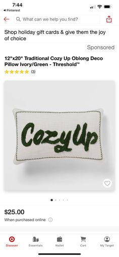 a pillow with the words cozy up on it, and an image of a hand embroidered pillow