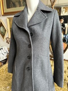 Expertly crafted for both style and functionality, the Tommy Hilfiger Wool Blend Peacoat in size XS boasts a tailored fit and sleek single breast design. Made with a durable and warm wool blend, this coat is perfect for cool weather and will elevate any outfit. Size: Extra Small Chest: 34” Waist: 28” Length: 35” This item is preloved Cool Weather, Small Chest, Brunei, Wool Blend, Tommy Hilfiger, Sleek, Wool, Design