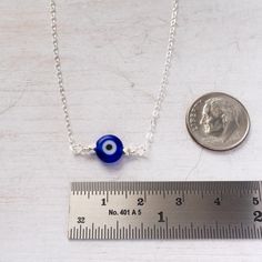 "Dainty Evil Eye Choker Necklace in Sterling Silver Minimalist take on traditional evil eye protection necklace. Dainty and lightweight, easy to wear everyday. Great on its own or for layering with other necklaces. Will make a wonderful gift for sister, friend, girlfriend. You can pair it with a matching bracelet: https://www.etsy.com/listing/572400297/ MEANING: The evil eye is a curse believed to be cast by a malevolent glare. Many cultures believe that receiving the evil eye will cause one mis Blue Nickel-free Charm Necklaces For Jewelry Making, Blue Charm Necklace With Adjustable Chain, Adjustable Blue Sterling Silver Charm Necklace, Blue Necklace 16 Inch As Gift, Blue 16 Inch Necklace As Gift, Evil Eye Choker, Evil Eye Protection, Turkish Evil Eye, Friend Girlfriend