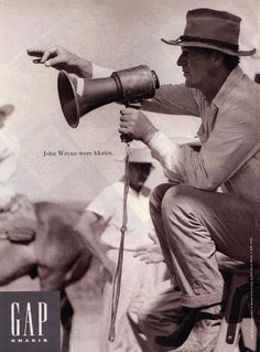 an old photo of a man with a megaphone