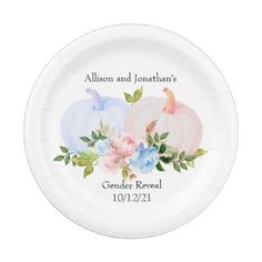 a white paper plate with pumpkins and flowers on the front, personalized for guests