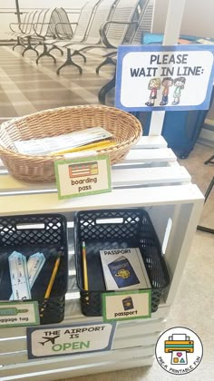 there is a basket on top of the counter with pens and pencils in it