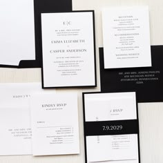 black and white wedding stationery with monogrammed envelopes