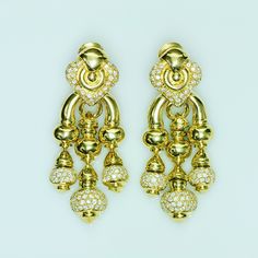 Chandelier Gold Diamond Earrings. Impressive chandelier 18K gold diamond earrings. The striking elegance of these chandelier earrings is exceptionally stunning. Measurements: Length: 2.5" Width: 1.1"Weight: 71.8 Grams Luxury Vintage Gold-tone Earrings, Gold Chandelier Earrings With Diamond Accents, Exquisite Diamond Chandelier Earrings In Gold, Luxury Gold Diamond Chandelier Earrings, Gold Diamond Chandelier Earrings, Elegant Yellow Gold Chandelier Earrings With 17 Jewels, Gold Chandelier Earrings With 17 Diamonds, Evening Diamond Gold Chandelier Earrings, Gold Diamond Chandelier Earrings For Evening