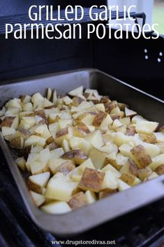 grilled garlic and parmesan potatoes in an oven with text overlay that reads grilled garlic and parmesan potatoes