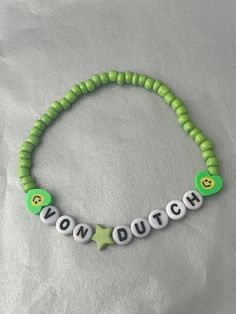 💚 Charli XCX friendship bracelet - Von Dutch 💚 Perfect for the Brat tour or as a gift 💚 Brat green beads, neon green heart smiley face bead, green star and black letters 💚 Comes beautifully wrapped Customizable Green Bracelet Jewelry, Trendy Green Name Bracelet For Gift, Handmade Adjustable Green Name Bracelet, Green Name Bracelet With Letter Beads, Green Personalized Bracelets With Round Beads, Personalized Green Bracelets With Round Beads, Trendy Green Beaded Bracelets With Letter Beads, Adjustable Green Bracelets With Letter Beads, Customizable Green Beaded Bracelets