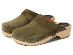 Swedish Hasbeens Swedish Husband - Women's Clog Shoes : Olive : Slip in to chic style with a 70s twist with the Swedish Hasbeens Swedish Husband mid-heel clog mules! The handcrafted clog mule is constructed from durable, chrome-free natural-grain leather upper that softens and slightly stretches with wear for versatile and timeless wear. Dyed, real fur from cow originated from Italy. Slip-on silhouette for easy on and off. Round, closed-toe front. Leather lining and heel insole. Durable lime-tre Swedish Hasbeens Clogs, Clog Mules, Swedish Hasbeens, Clog Shoes, Wooden Clogs, Socks Sneakers, Clog Heels, Wood Heel, Shoe Boot Sandals