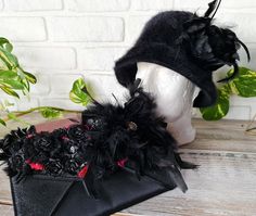 DESCRIPTION Black soft rabbit yarn  hat with feathered beaded flower and black feathered night clutch -party hat and accessories A beautiful and unique soft woman accessories  .Only one set . Lovely touch, perfect for spring/autumn and winter. MATERIALS Soft and cozy rabbit yarn and black feather, pearly beads , zircon ,handmade black flowers. SIZE One size hat  -standart . Clutch size -16cm x25 cm CARE Recommended hand wash and dry flat Do not bleach NOTES Please note that due to lighting effects, monitor's brightness, contrast and other settings, there might be slightly differences of the colour tone/shade of the web site's photo and the actual item. SHIPPING We send our parcels with fast shipping -FedEx or UPS .This hat is ready to ship item. Shipping takes 2-3 working days. Your order Feather Trim Mini Hats For Kentucky Derby Evening, Evening Fascinator With Feather Trim, Black Gatsby Party Costume Hats And Headpieces, Kentucky Derby Evening Mini Hat With Feather Trim, Black Gatsby Party Hat, Evening Costume Hat With Feathers, Flapper Style Fascinator For Kentucky Derby Evening, Flapper Style Evening Fascinator For Kentucky Derby, Flapper Costume Hats For Kentucky Derby Party