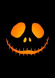 an orange jack o lantern face on a black background