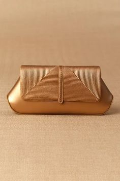 Gold faux leather clutch with geometric shape, cord work flap and center detailed strip.
Type: Cord Work
Composition: 100% Faux Leather
Color: Gold
Weight (gms): 300-400
Size LxWxD (in inch): 10.0x1.8x4.5 - Aza Fashions Fancy Hands, Gray Handbags, Colorful Handbags, Embellished Clutch, Gold Mandala, Gold Clutch, Gold Handbags, Leather Conditioner, Buy Gold