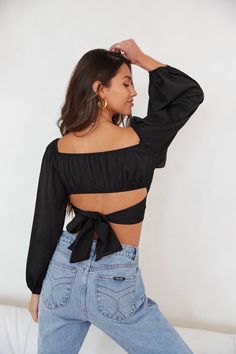 Channel your inner angel with The April Puff Sleeve Wrap Crop Top. This beautiful top features a criss cross front detail, long bow ties, and puff sleeves. Available in black and white. Pair with some denim to complete the look! Details 75% Cotton, 25% Polyester Cropped Long sleeves Silicone grips Material has some stretch Hand wash cold / Line dry Sizing & Fit Fits true to size Model is 5'9 wearing a size Small Model Measurements: Bust 34” Waist 25.5” Hips 37.5” Size Guide Long Bow, Wrap Crop Tops, White Crop Top, Bow Ties, Model Measurements, Puff Sleeves, All Seasons, Criss Cross, Puff Sleeve