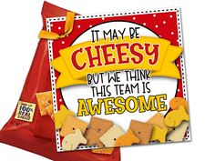 a bag of cheesy crackers with the words it may be cheesy but we think this team is awesome