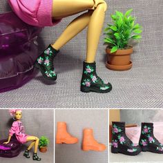 there is a doll sitting next to a potted plant and wearing rain boots with flowers on them