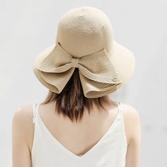 Elegant and Functional: The Perfect Summer Accessory Introducing the Women’s Summer Simple Sun Hat – your ultimate companion for sunny days. Designed with elegance and functionality in mind, this stylish hat features small eaves and a charming bow, making it perfect for beach outings, outdoor adventures, or casual strolls. Made from natural straw, this collapsible hat combines sophistication with practicality, ensuring you stay protected from the sun while looking effortlessly chic. Product Features Stylish Bow Design: The bow adds a touch of femininity and elegance to this classic sun hat. Adjustable Size: Fits head sizes 54-58cm, ensuring a comfortable and secure fit for all. Small Eaves: The 6cm brim provides just the right amount of shade, perfect for sunny days. Collapsible and Portab Chic Sun Hat With Bow For Summer, Chic Bow Sun Hat For Summer, Chic Summer Sun Hat With Bow, Chic Cloche Hat For Beach And Kentucky Derby, Chic Sun Hat With Bow For Vacation, Chic Vacation Sun Hat With Bow, Spring Sun Hat With Curved Brim And Bow, Chic Adjustable Hat With Bow, Elegant Beige Bucket Hat For Vacation