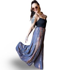 Add a pop of color and boho vibes to your wardrobe with our these Tie Dye Wide Leg Palazzo Pants. These flowy tiered pants can be dressed up or down for any occasion. Don't be afraid to get creative with your style! Free Size, will fit sizes up to an XL best Waist 24-36", Inseam 26", Front/Back Rise 16", Length 42" Hips: up to 50" Rayon Fair Trade made in Nepal Handwash or machine wash delicate Air Dry/Tumble Dry Low Please take a moment to look over all shop policies before purchasing. Flowy Bohemian Maxi Skirt For Day Out, Bohemian Flowy Maxi Skirt For Day Out, Spring Boho Print Harem Bottoms, Bohemian Maxi Skirt For Day Out, Bohemian Maxi Skirt With Elastic Waistband For Day Out, Boho Print Harem Bottoms For Summer, Summer Boho Print Harem Bottoms, Summer Maxi Length Bottoms For Day Out, Summer Festival Wide-leg Harem Pants