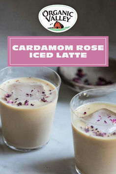 two glasses filled with ice cream and garnished with crumbled purple flowers