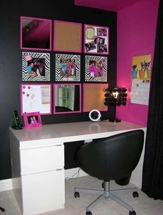 a desk with a chair and pictures on the wall behind it in a pink room